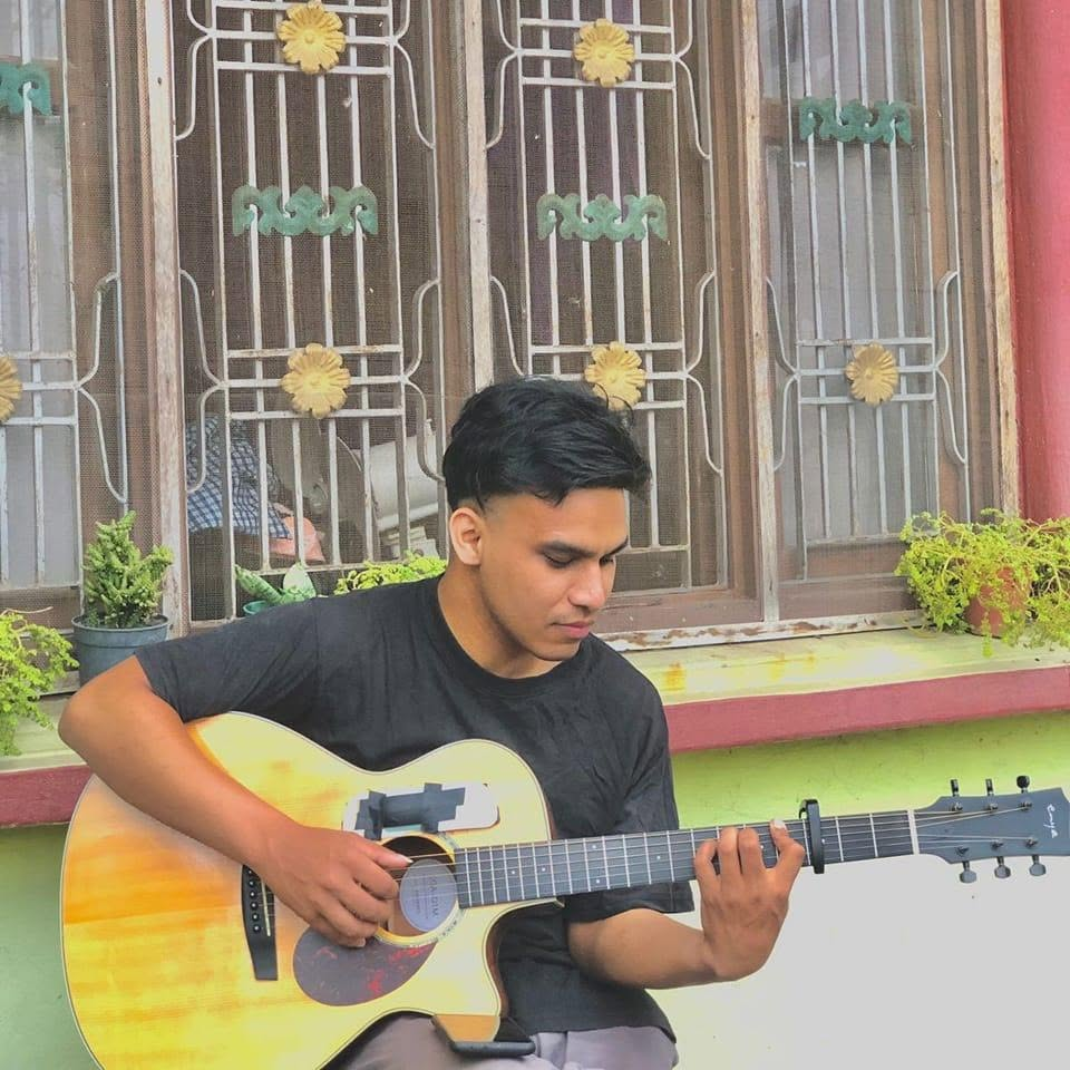 Pratik playing guitar